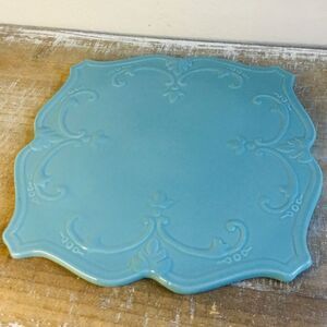 Blue ceramic tray holder centerpiece with classic raised design